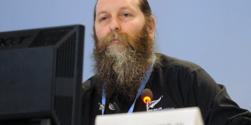 Pete Smith standing in front of a podium