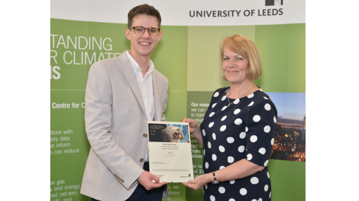 University of Leeds Chancellor Professor Dame Jane Francis presenting Tom Slater, with his Piers Sellers PhD Prize certificate in 2019