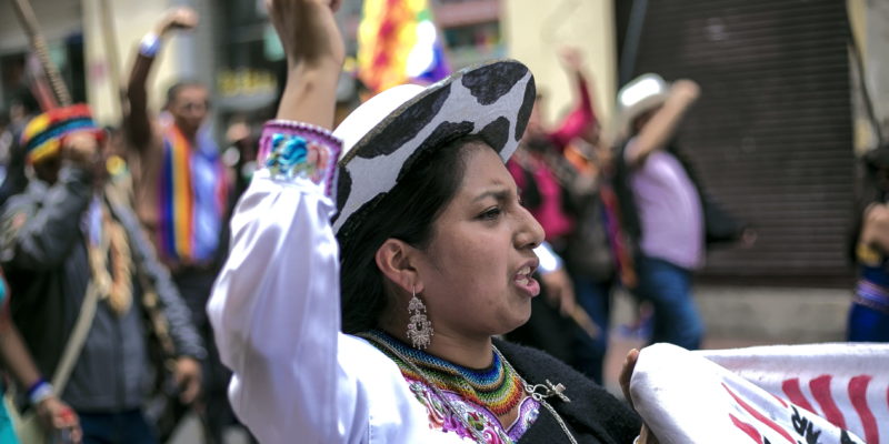 An Indigenous woman in Brazil shouts during a protest