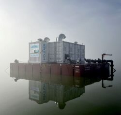 barge with shipping containers on